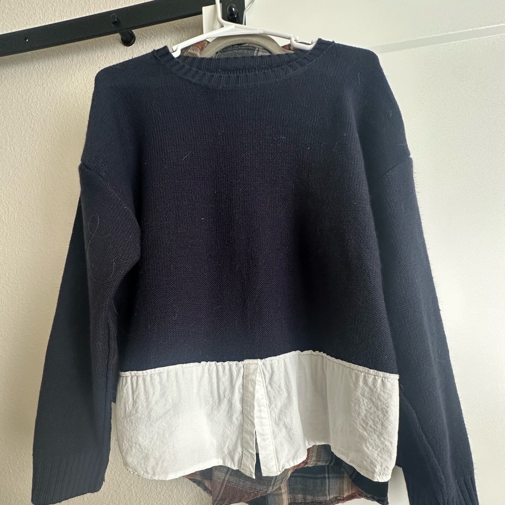 bohme Black Crewneck Sweater with White Shirt Hem Detail